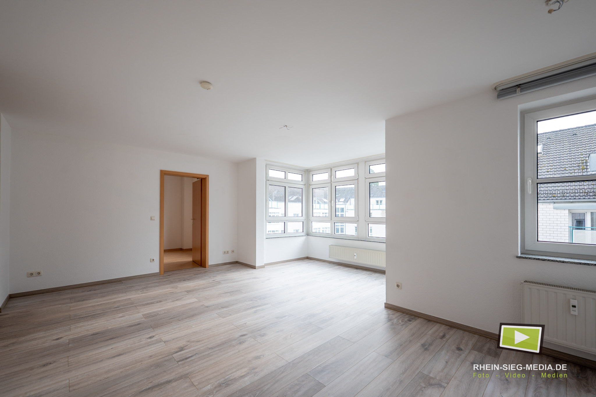 immobilienfotografie wohnzimmer leere wohnung